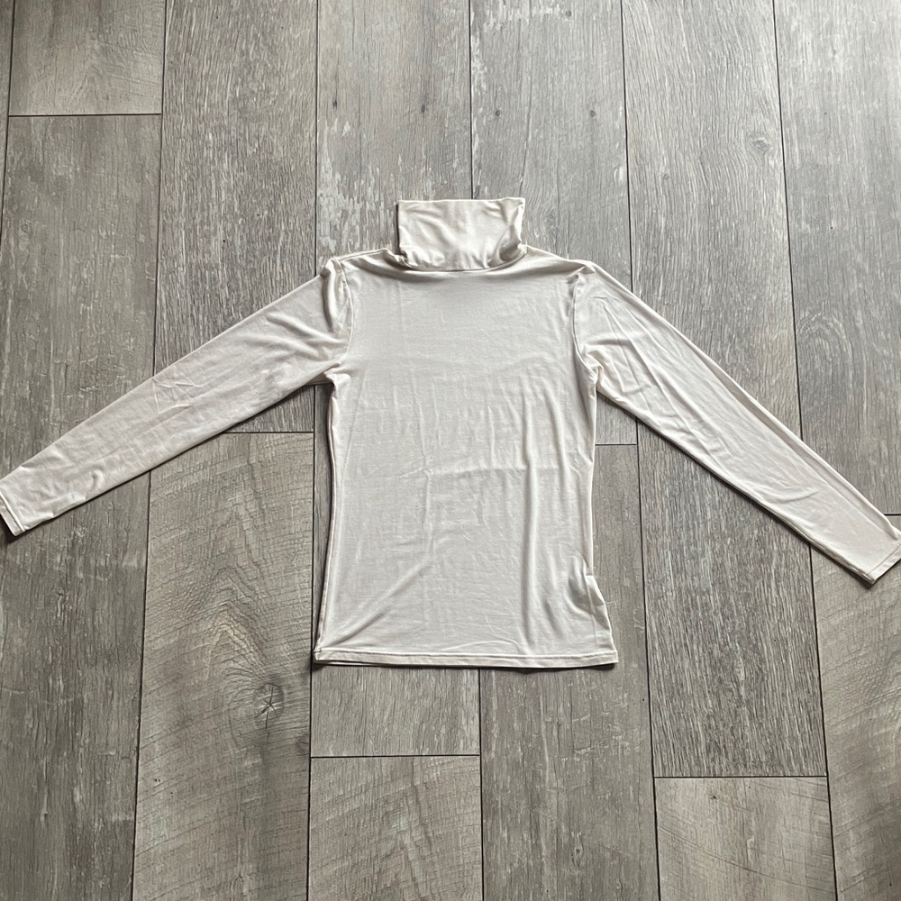 UNIQLO HEAT TECH Cream Turtleneck Top